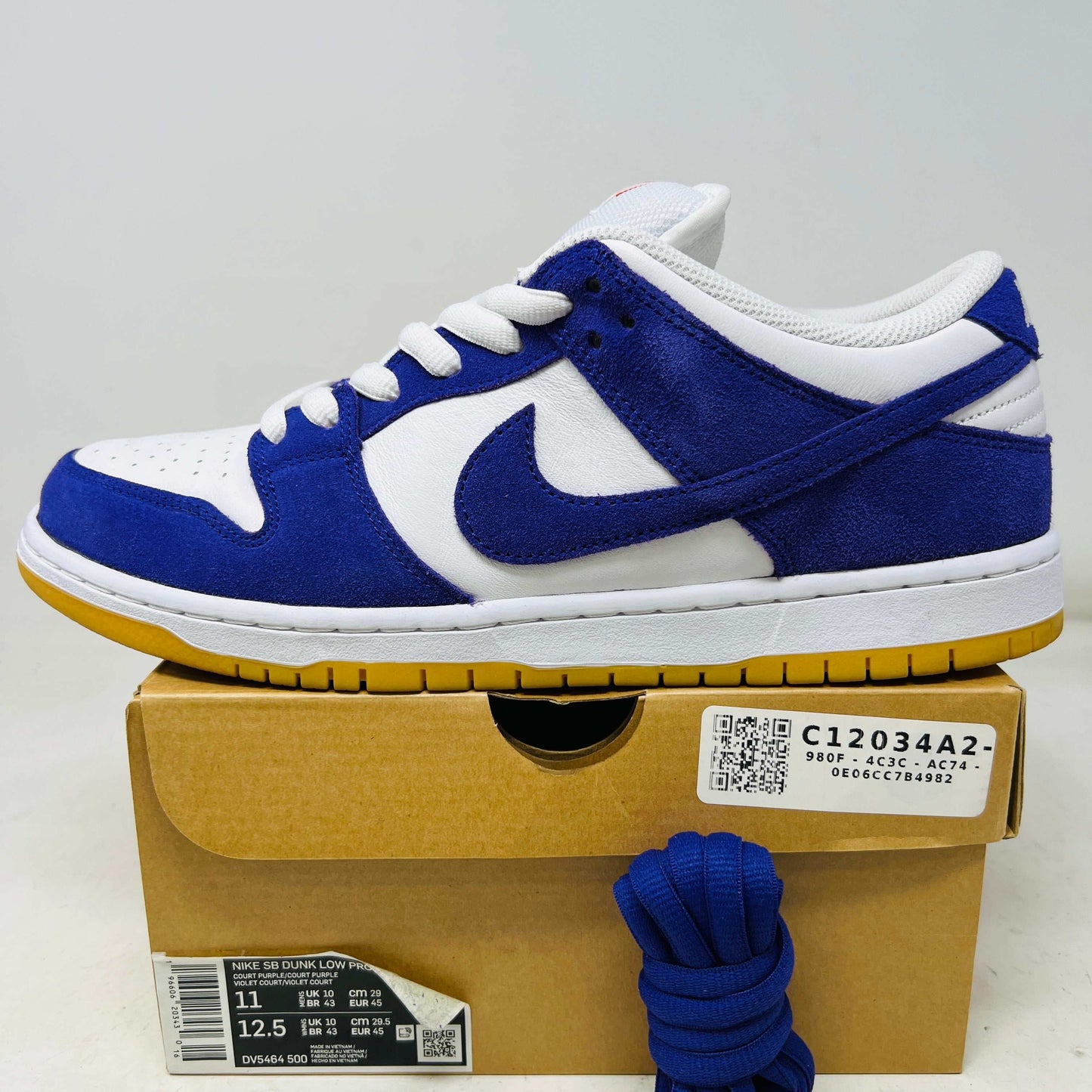 Nike SB Dunk Low Pro ISO sneaker in blue and white on box with extra blue laces 2023 release