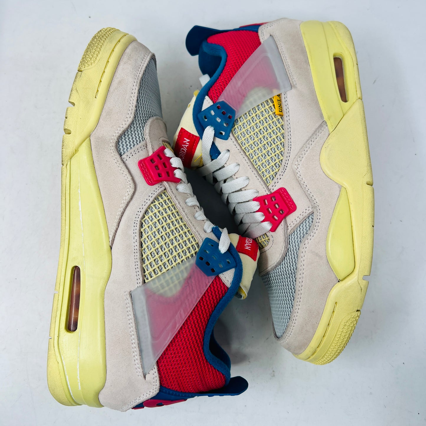 Jordan 4 Retro Union Guava Ice