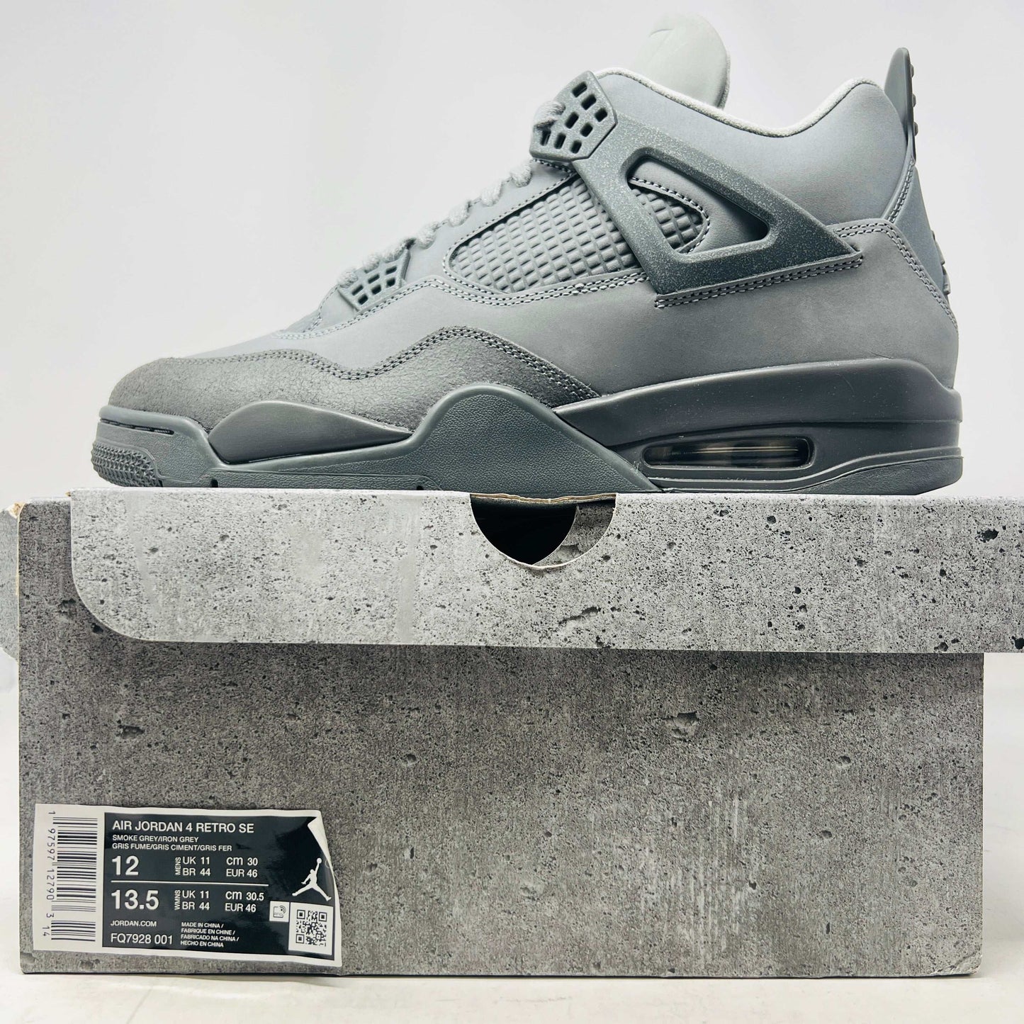 Jordan 4 Retro SE Paris Olympics Wet Cement sneaker in gray on matching textured box 2024 release
