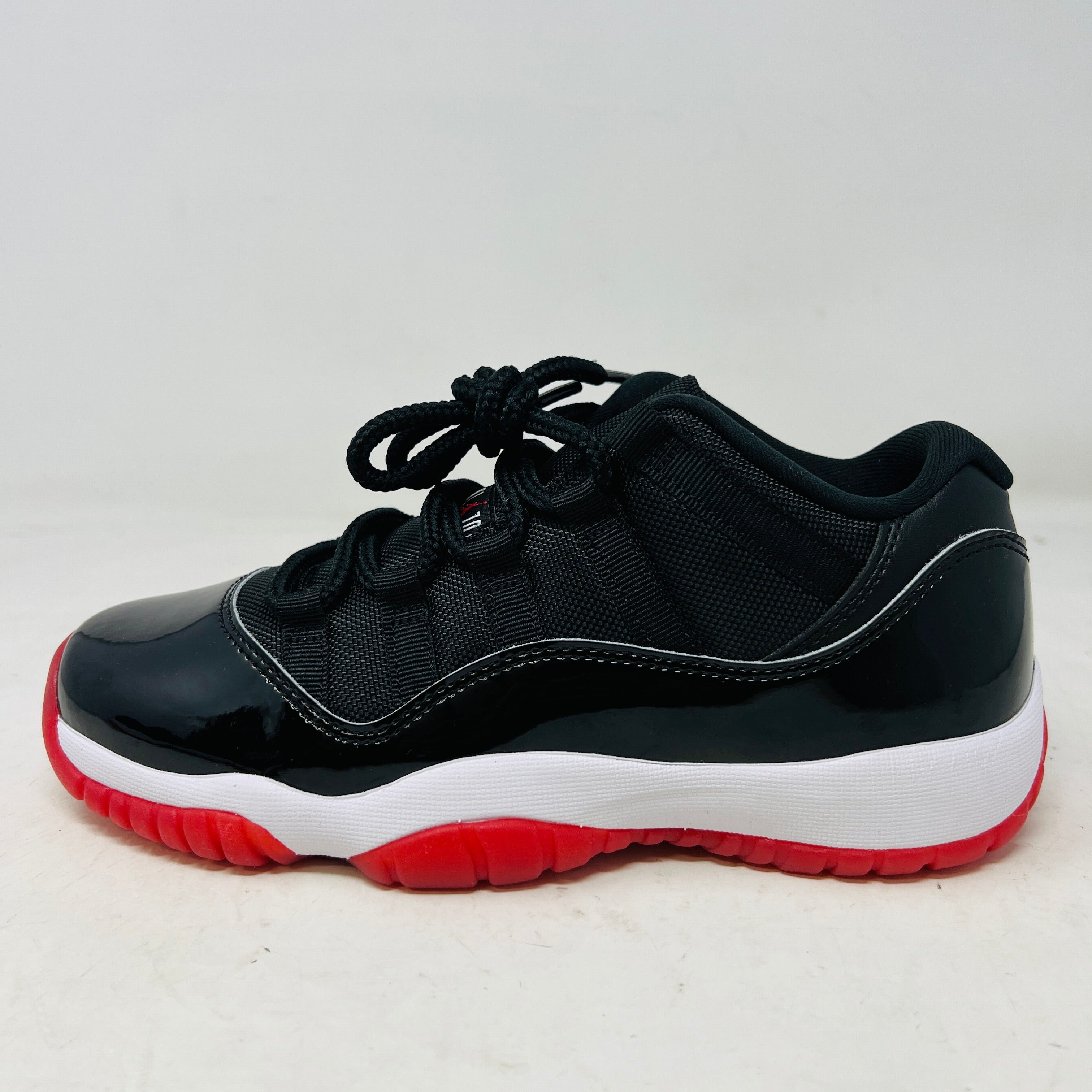 Jordan 11 Retro Low Bred (GS) (2025) (B-Grade) – Holy Ground