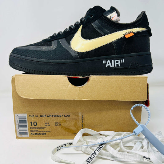 Nike Air Force 1 Low Off-White black and white sneaker with yellowed swoosh on box with laces and hang tag