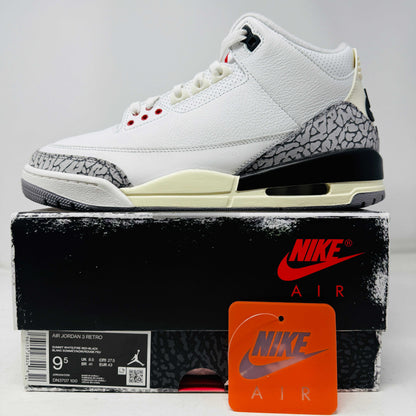Jordan 3 Retro White Cement sneaker on black Nike Air box with red logo, clean 2023 edition