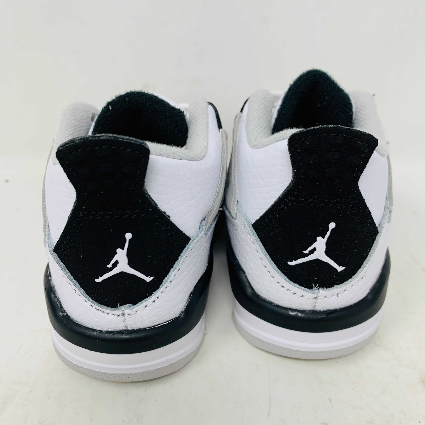 Jordan 4 Retro Military Black TD, brand new, 2022 release, rear view.