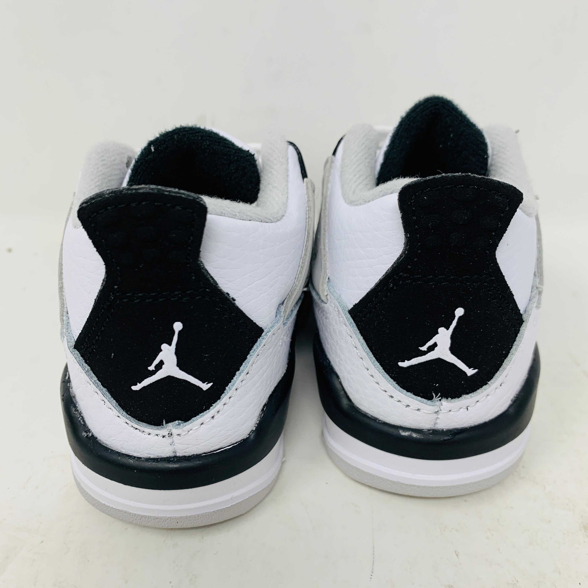 Jordan 4 Retro Military Black TD, brand new, 2022 release, rear view.