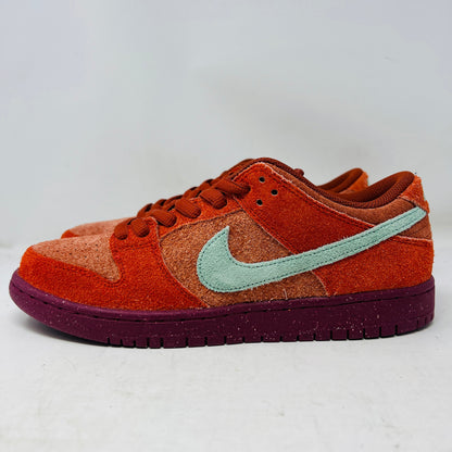 Nike SB Dunk Low Mystic Red Rosewood sneaker in red and brown suede with teal swoosh and purple sole, 2023 model