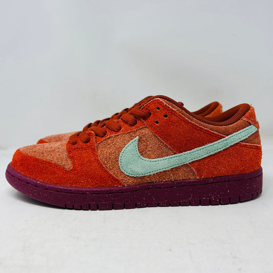 Nike SB Dunk Low Mystic Red Rosewood sneaker in red and brown suede with teal swoosh and purple sole, 2023 model