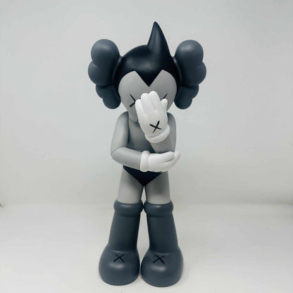 KAWS Astro Boy Vinyl Figure Grey in good condition.