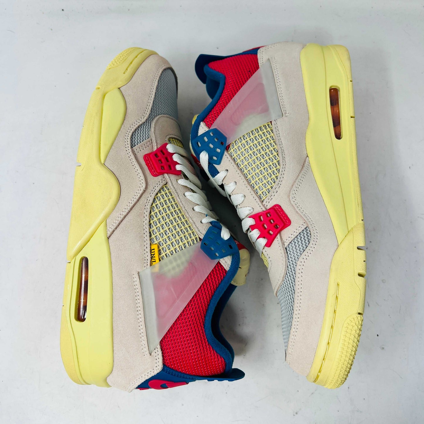 Jordan 4 Retro Union Guava Ice