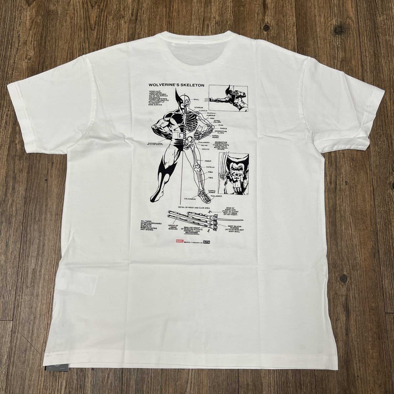 Kith x Marvel X-Men Anatomy Vintage Tee White featuring Wolverine's skeleton diagram.