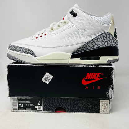 Jordan 3 Retro White Cement Reimagined sneaker on box.