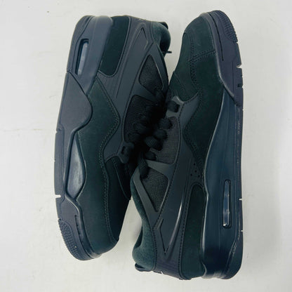 Jordan 4 RM Black Cat sneakers with sleek black design and grey accents.