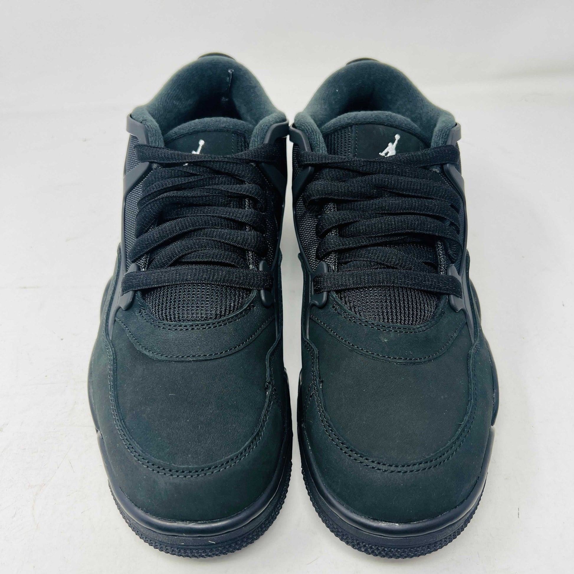 Jordan 4 RM Black Cat sneakers, black and grey design, premium leather, Air-Sole cushioning.