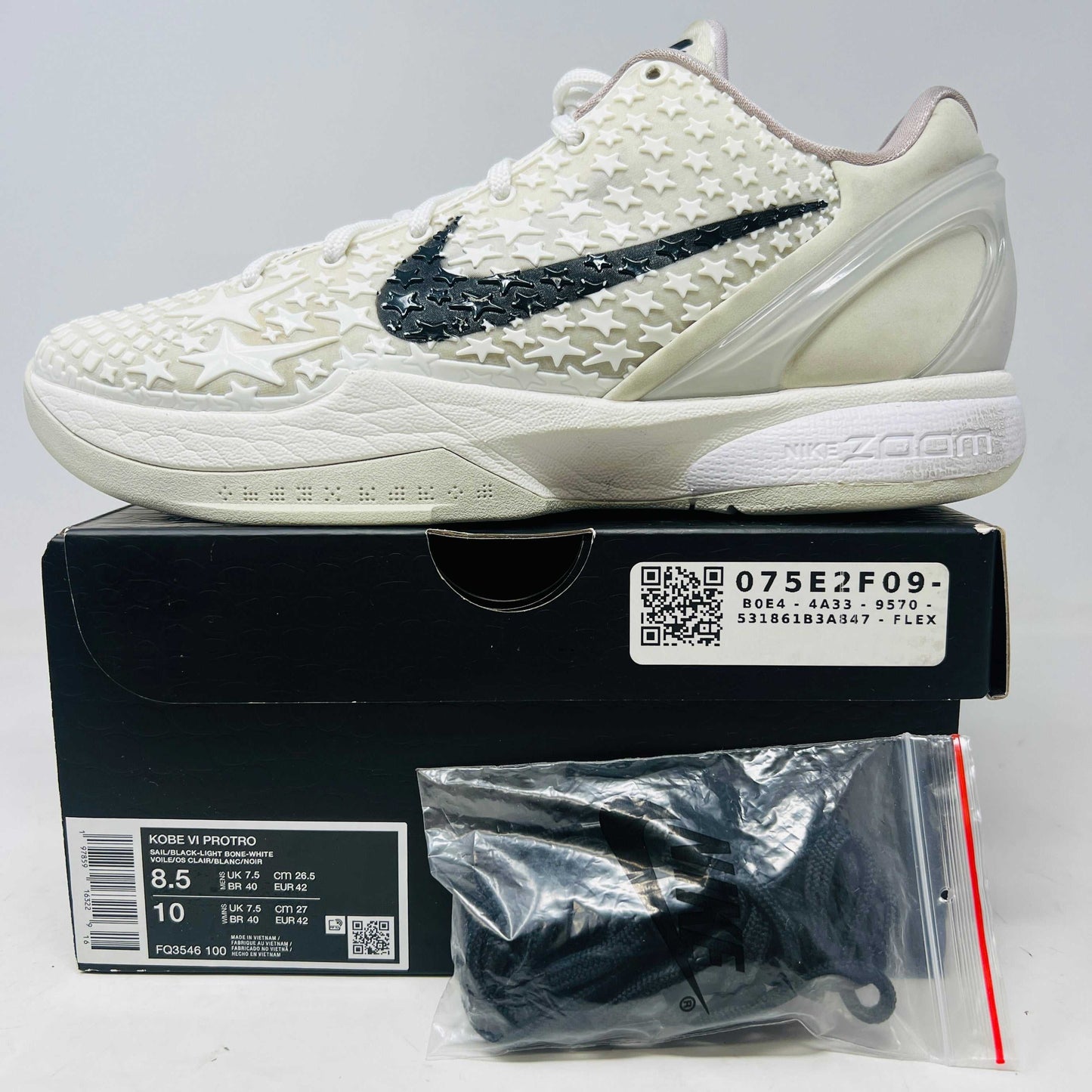 Nike Kobe 6 Protro Sail All-Star sneaker in cream with black swoosh, size 8.5, displayed on box with extra laces in bag