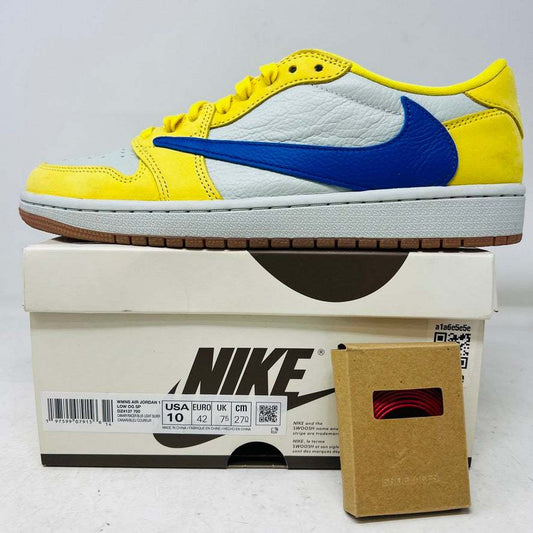 Jordan 1 Retro Low OG Travis Scott Canary sneaker in yellow and blue on box with extra laces
