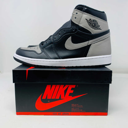 Jordan 1 Shadow 2018 sneakers with grey laces on a Nike box. Brand new condition.