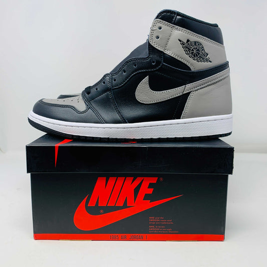 Jordan 1 Shadow 2018 sneakers with grey laces on a Nike box. Brand new condition.