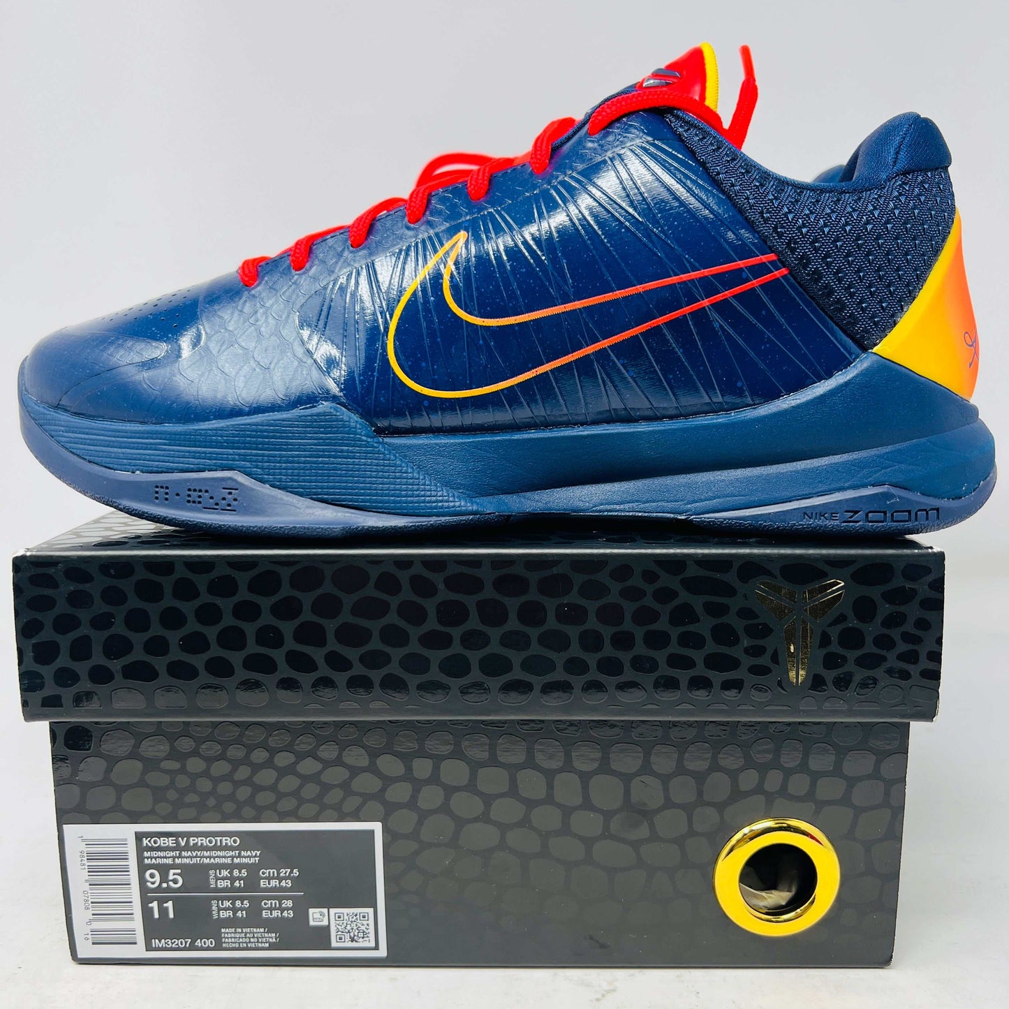 Nike Kobe 5 Protro Caitlin Clark Indiana Fever basketball shoe on box, blue with red and yellow accents