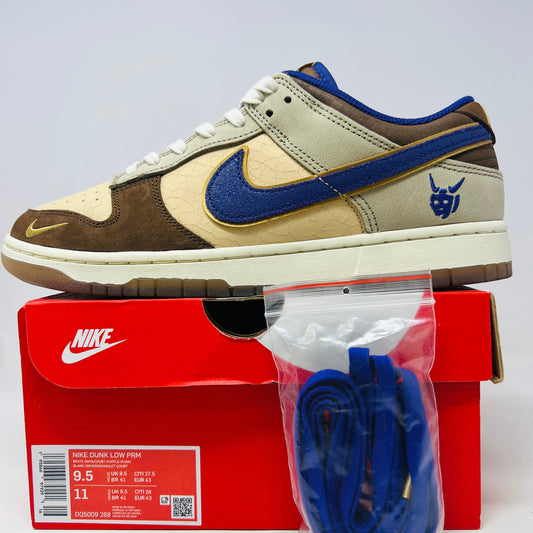 Nike Dunk Low Setsubun sneakers with extra laces, displayed on an original box.