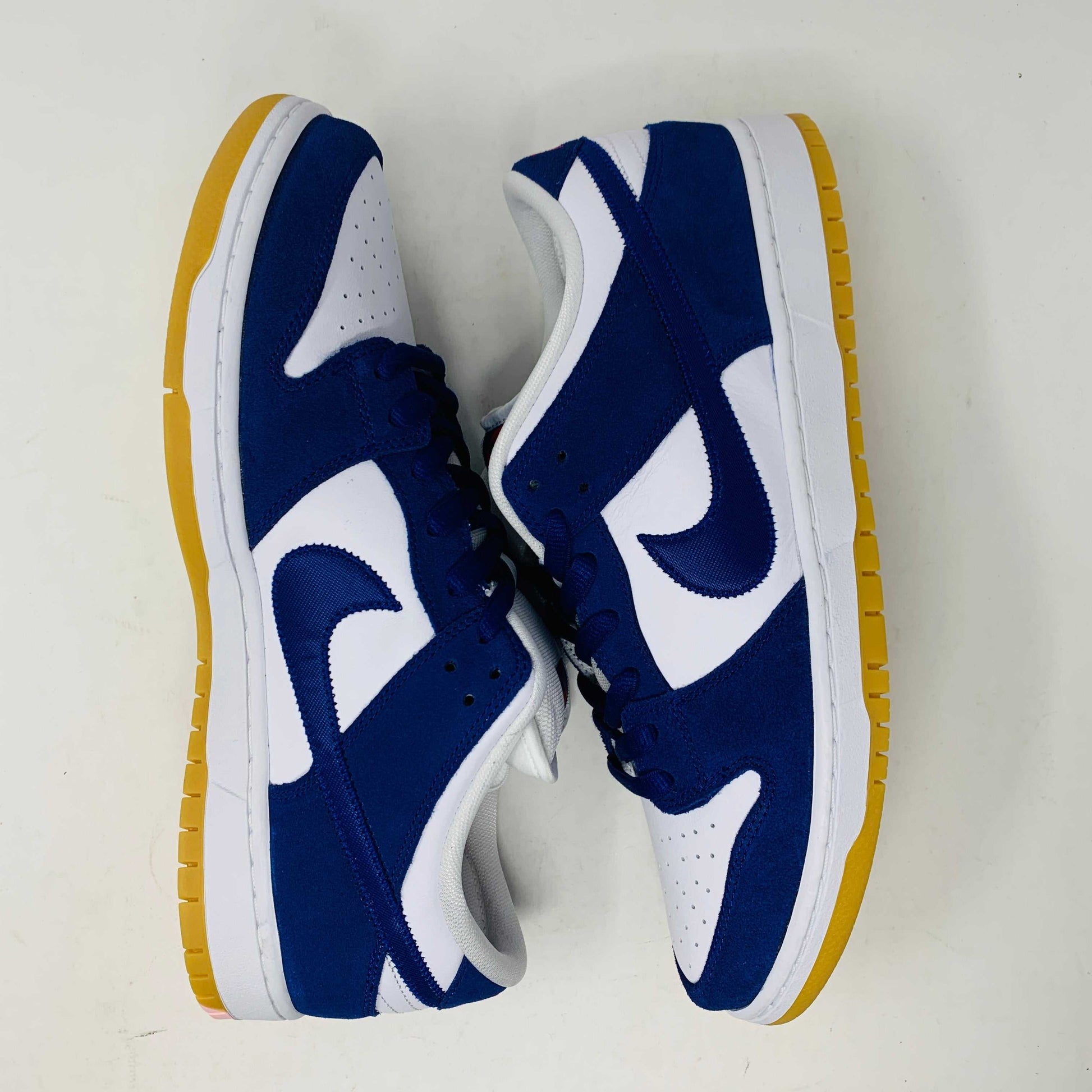 Nike SB Dunk Low Dodgers sneakers, featuring blue and white colorway with gum soles, 2022 edition.