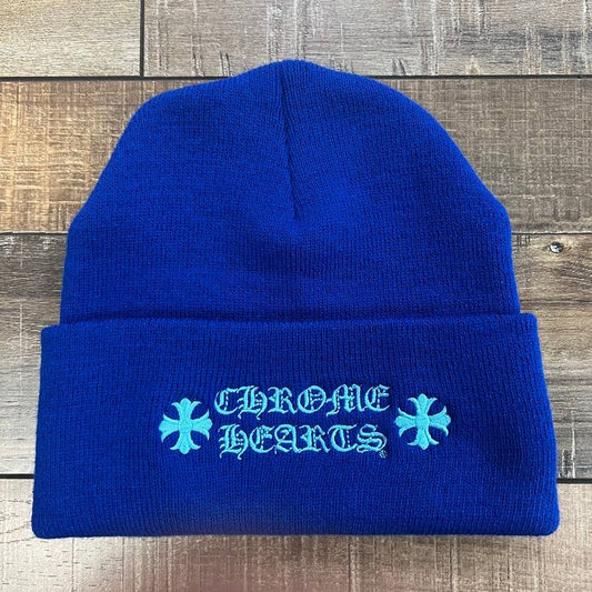 Chrome Hearts Embroidered blue beanie with cross design.
