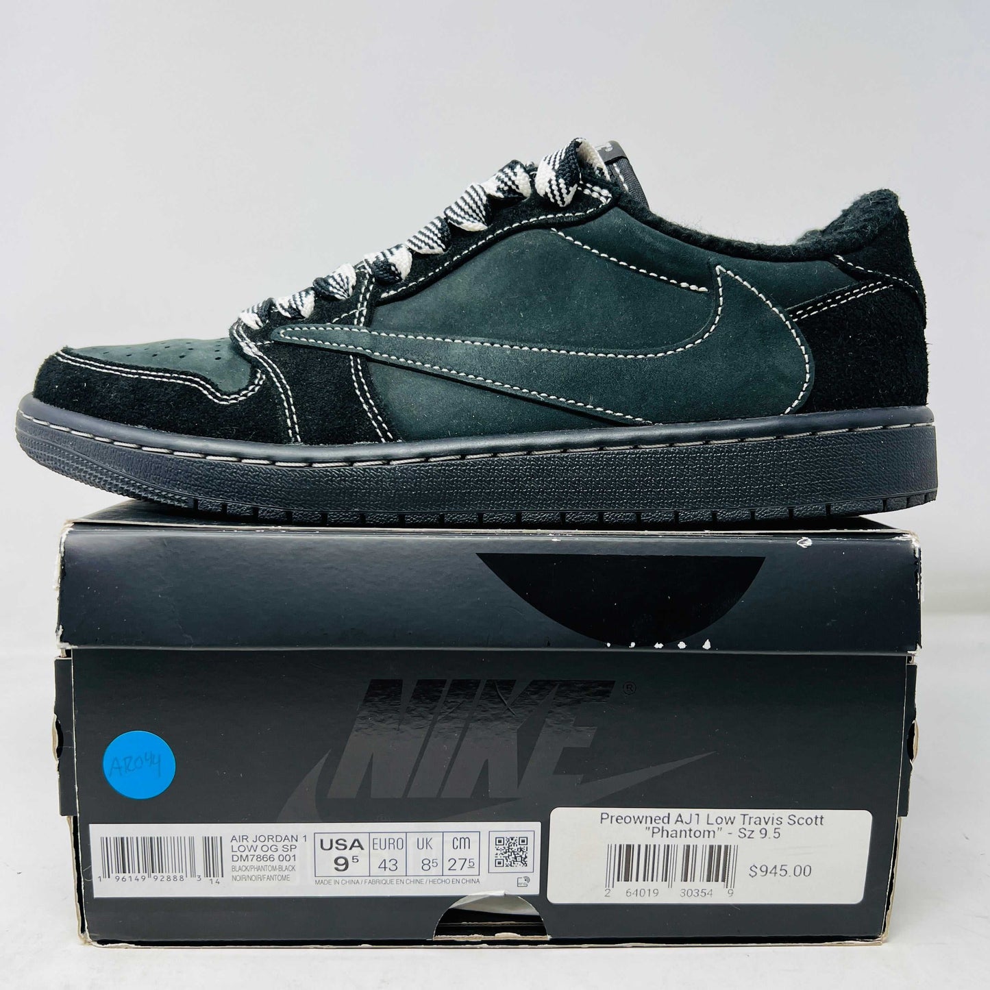Jordan 1 Retro Low OG SP Travis Scott Black Phantom sneakers with box, size 9.5, includes extra laces and bandanas, preowned condition.
