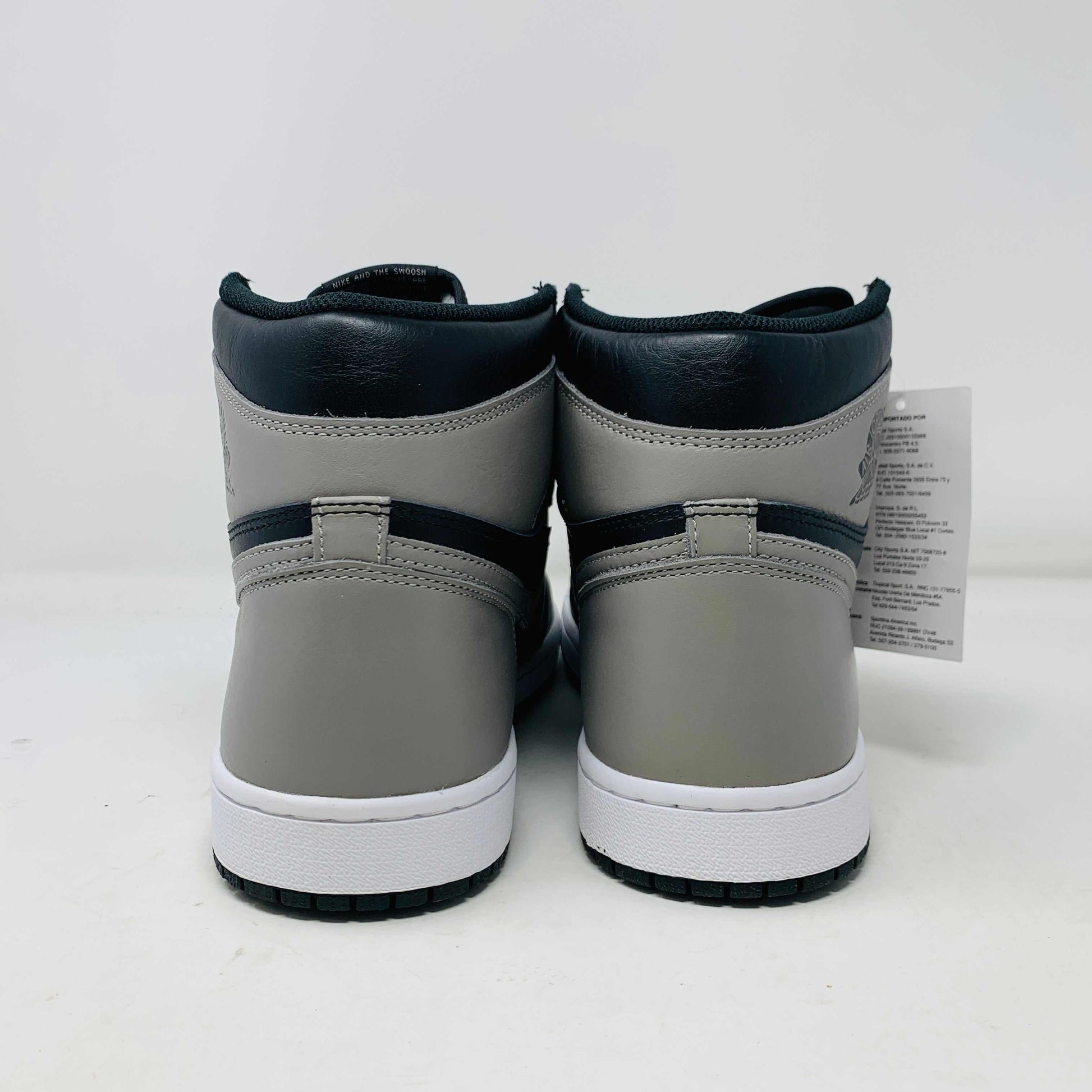 Jordan 1 Shadow 2018 sneakers with grey laces on a Nike box. Brand new condition.