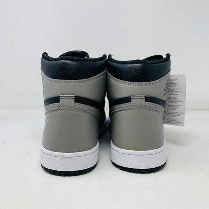 Jordan 1 Shadow 2018 sneakers with grey laces on a Nike box. Brand new condition.