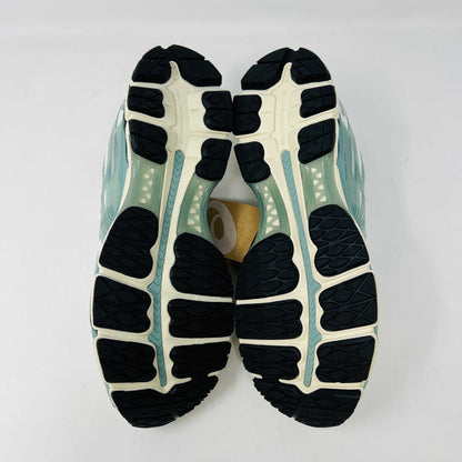 The ASICS Gel-Kayano 12.1 Kith Cream Sage sneakers in pastel green and white feature a breathable mesh design. Theyre accompanied by two packs of extra laces (green and white with black speckles), offering versatile styling for your 100% authentic needs.