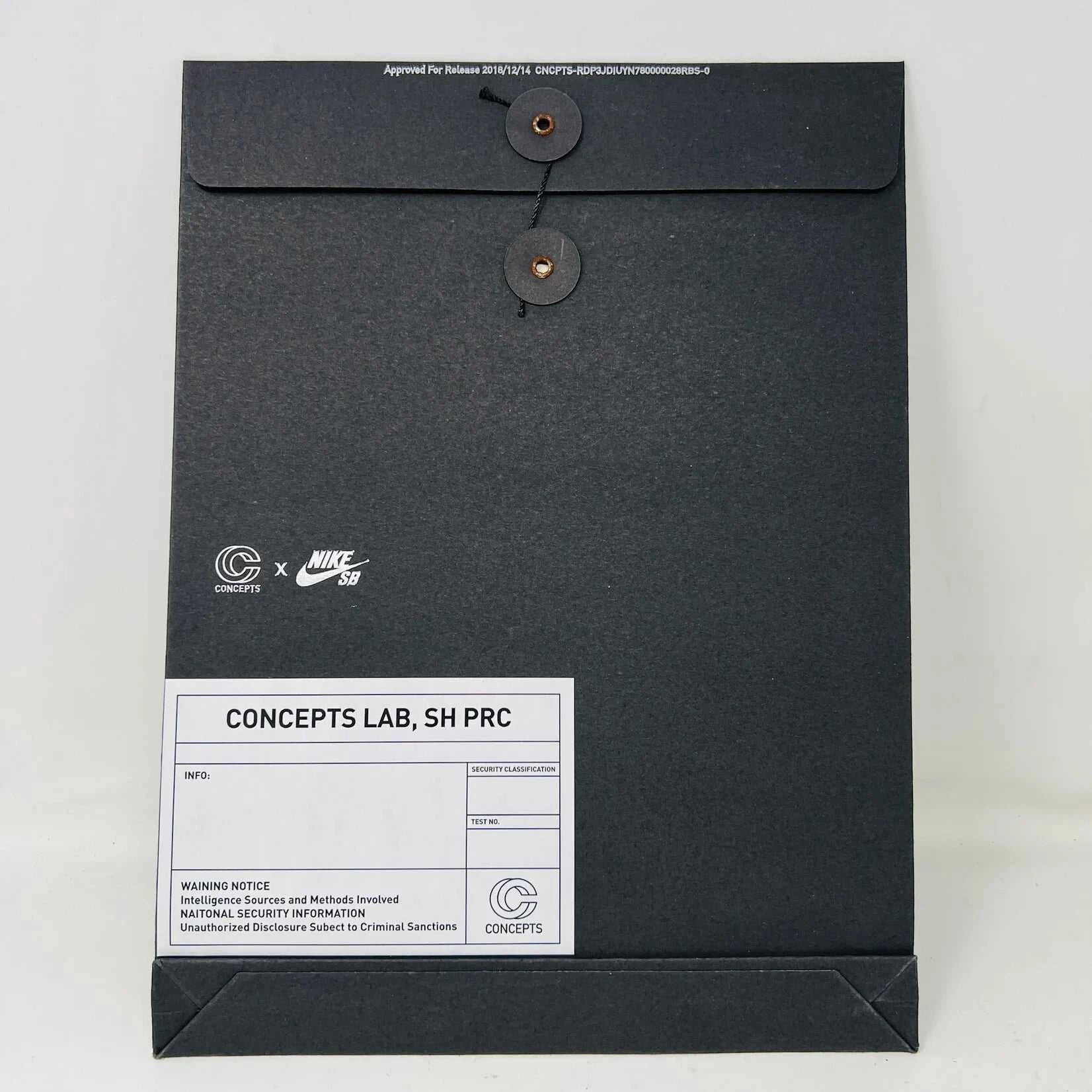The Nike SB Dunk Low Concepts Green Lobster sneakers, with silver Swooshes and displayed on their Shanghai Special Box, come with extra pink and black laces. They feature green midsoles and a checkered inner lining for that iconic touch.