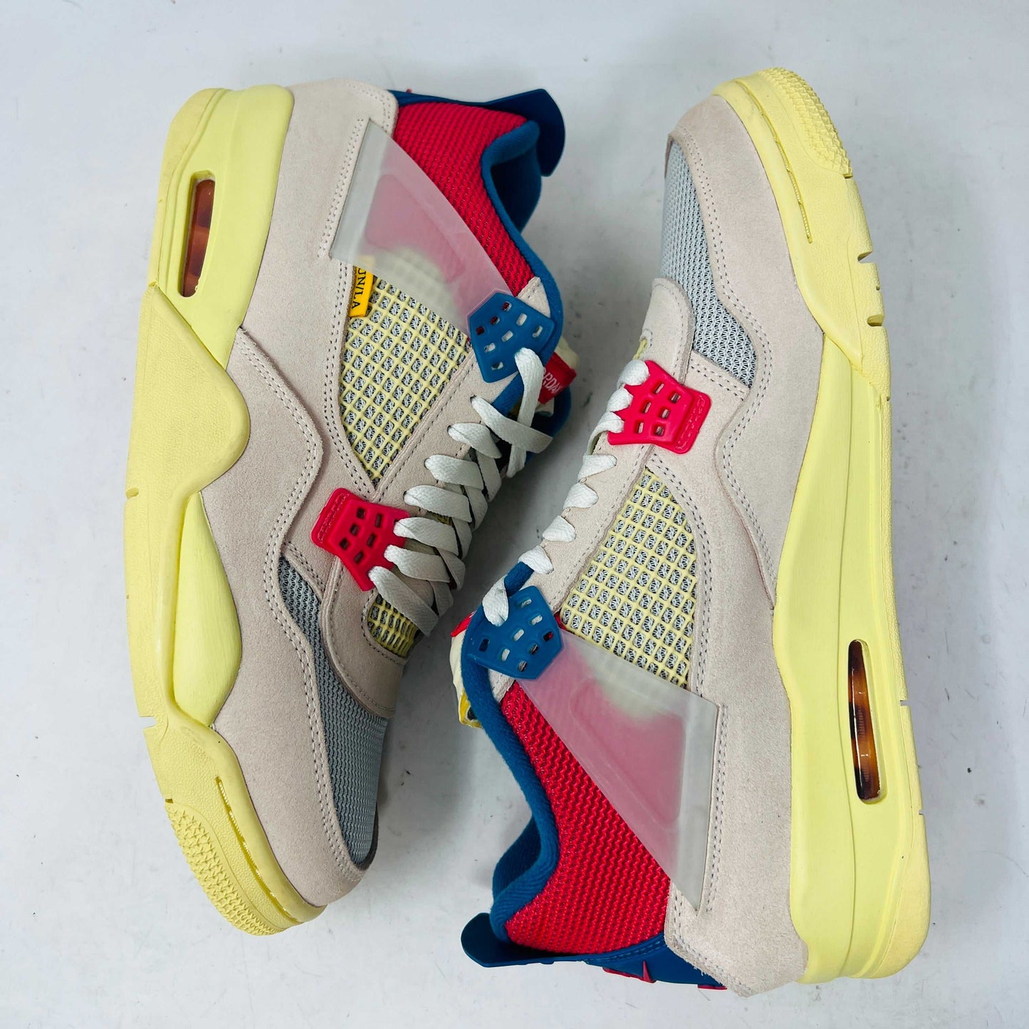 Jordan 4 Retro Union Guava Ice