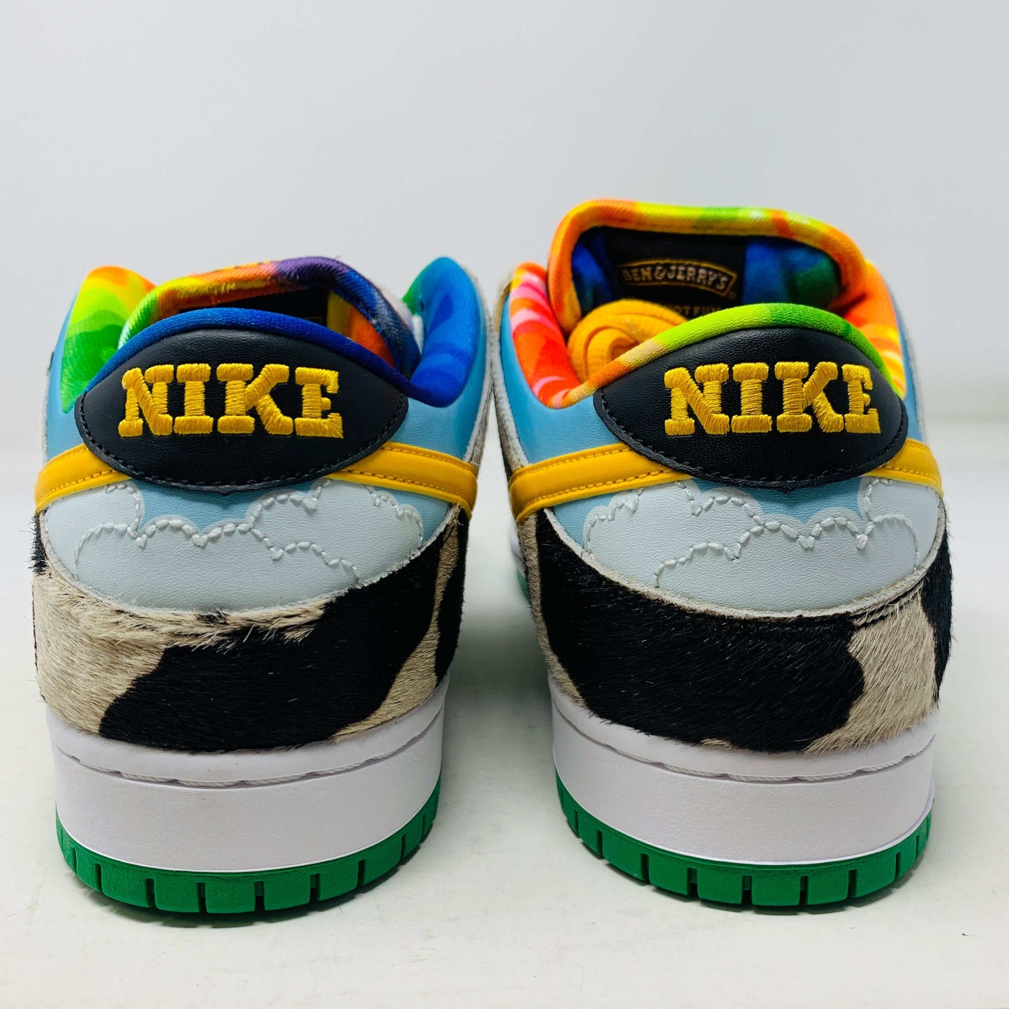 Introducing the new Nike SB Dunk Low Chunky Dunky with a vibrant cow print, featuring blue, green, and yellow sections. This 100% authentic sneaker includes a yellow swoosh and comes in a matching green and yellow box with extra laces, all from Nike.