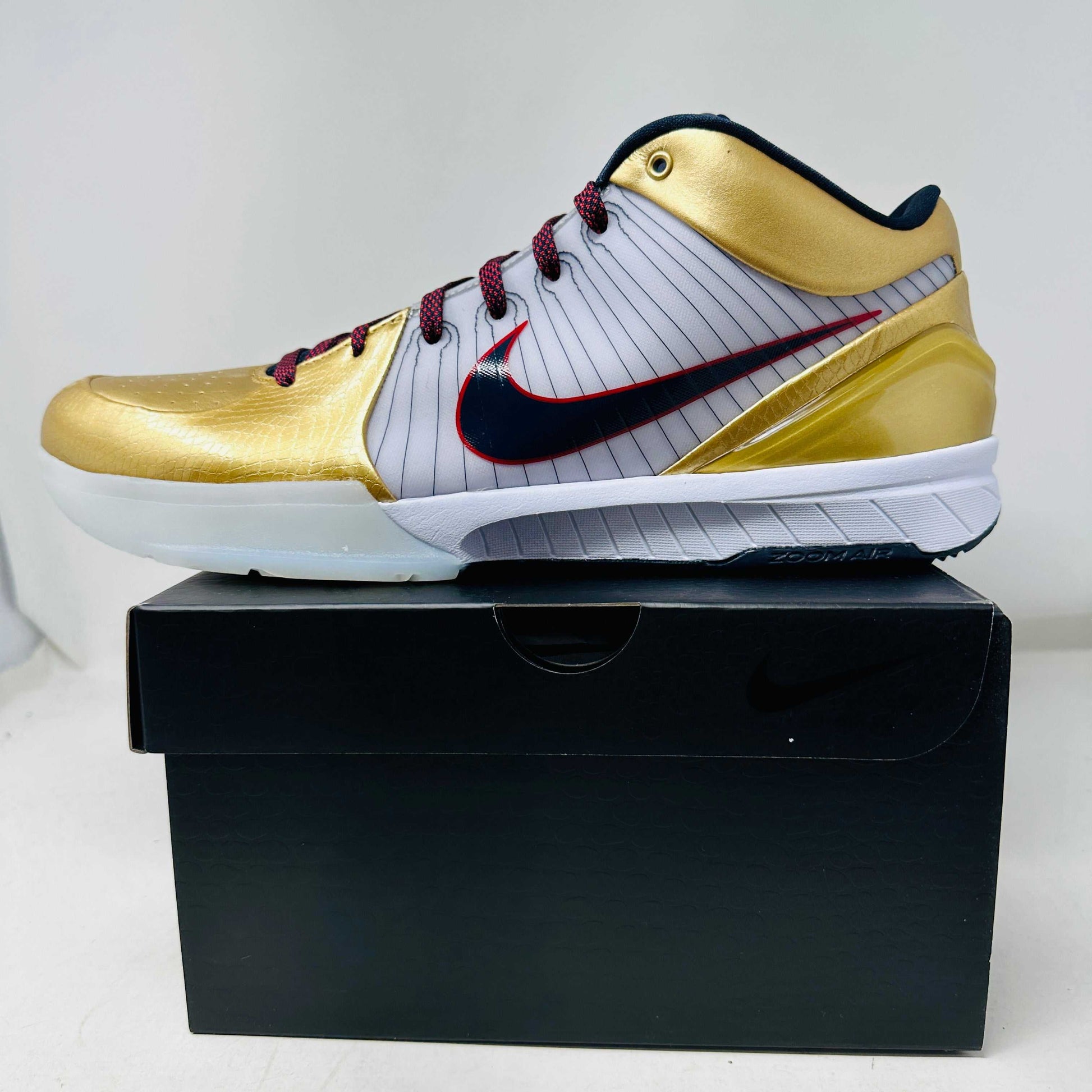Nike Kobe 4 Protro Gold Medal 2024 sneakers on box, brand new condition.