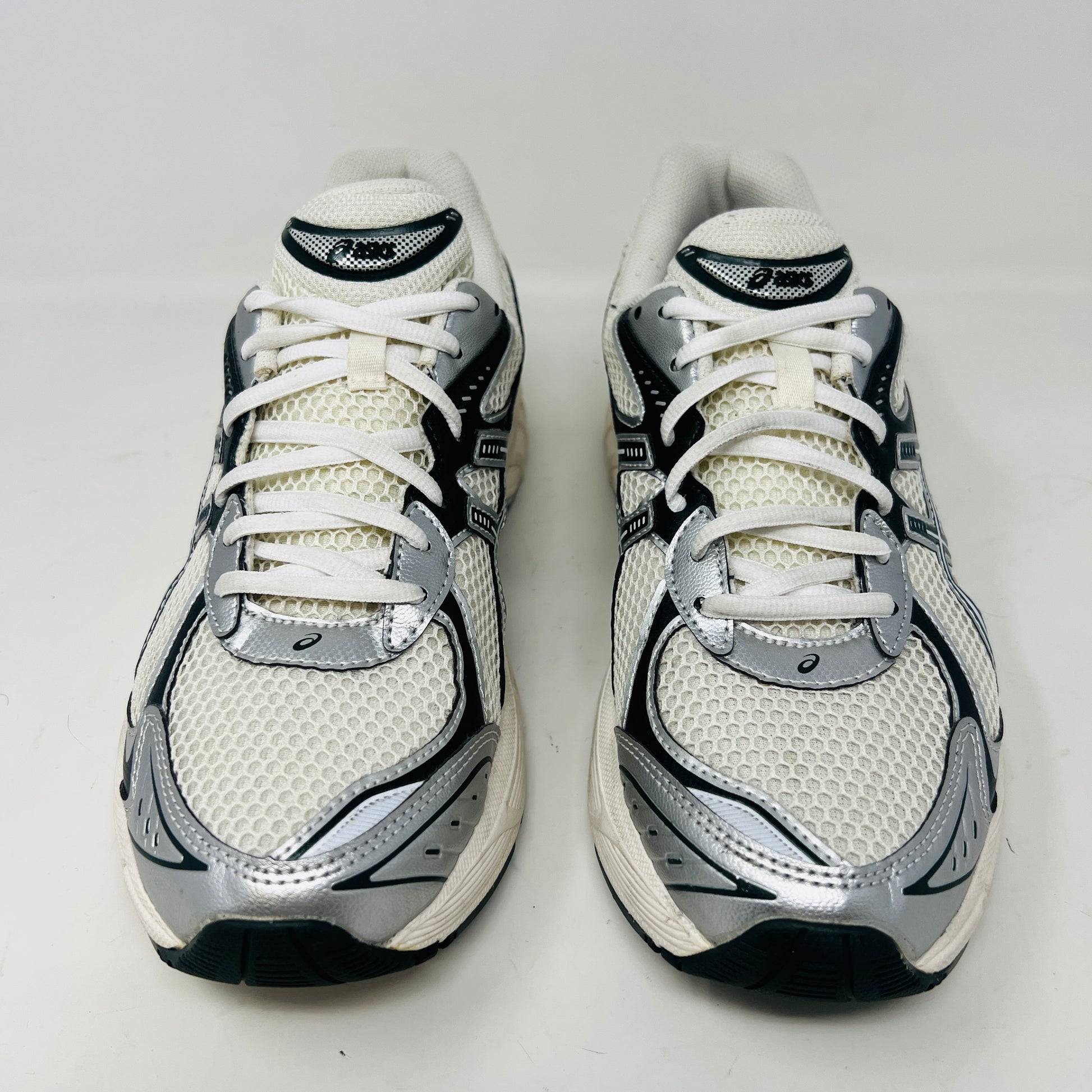 An ASICS GT-2160 Kith Cream Scarab (2023) running shoe with a clean cream and scarab-colored mesh design featuring black accents sits on a brown box. Priced at $350, the box in good condition details sizing and brand logos.