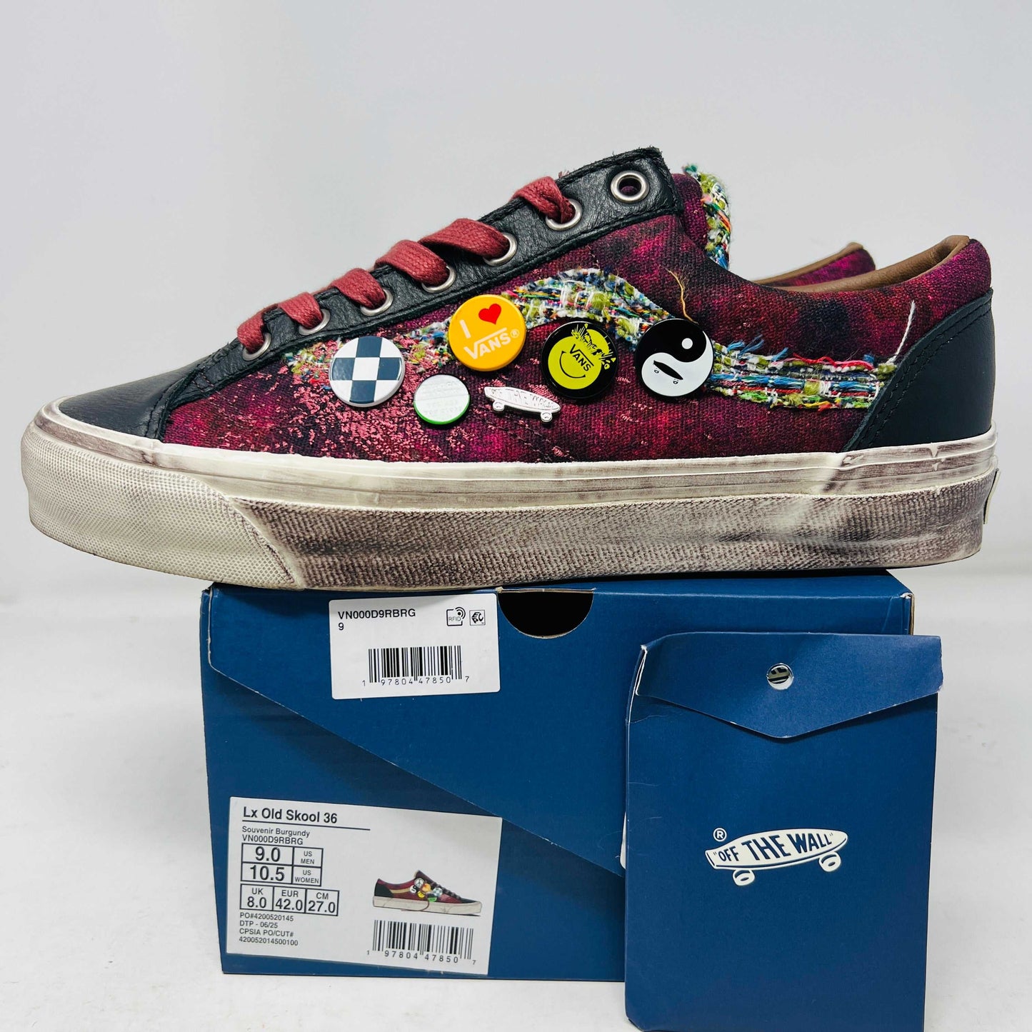 Vans Old Skool 36 LX Souvenir Burgundy sneaker with pins on side and worn sole on shoe box