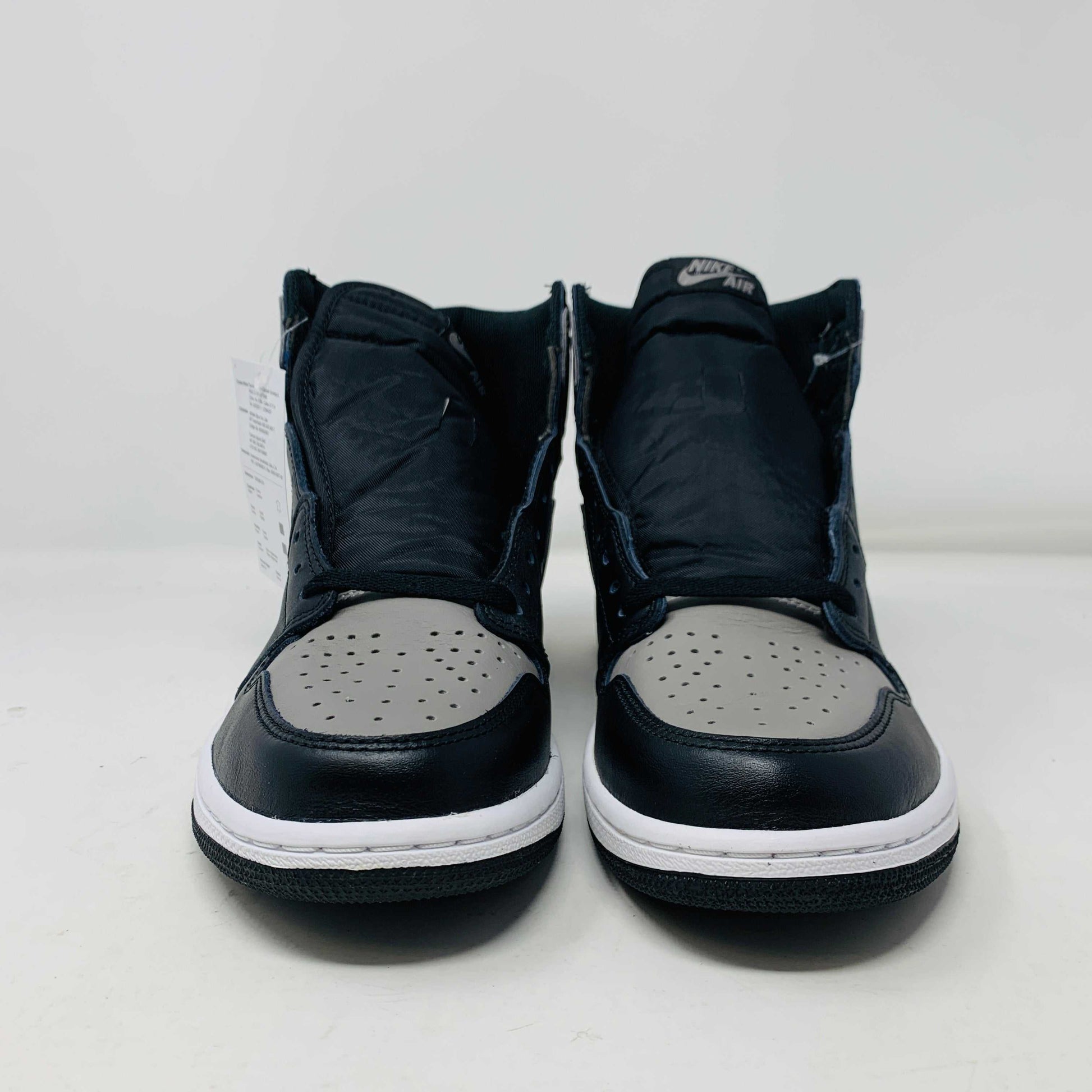 Jordan 1 Shadow 2018 sneakers with grey laces on a Nike box. Brand new condition.
