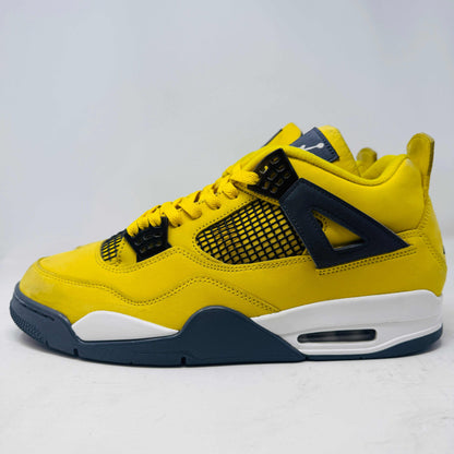 Jordan 4 Retro Lightning 2021 yellow and black sneaker side view, used condition