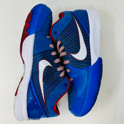 A Nike Kobe 4 Protro Philly (2024) sneaker, blue with red accents and a white swoosh, sits on a black Nike box in excellent condition. Perfect for general wear, it features pinstripes and ZOOMAIR on a white sole. The box shows size and model details.