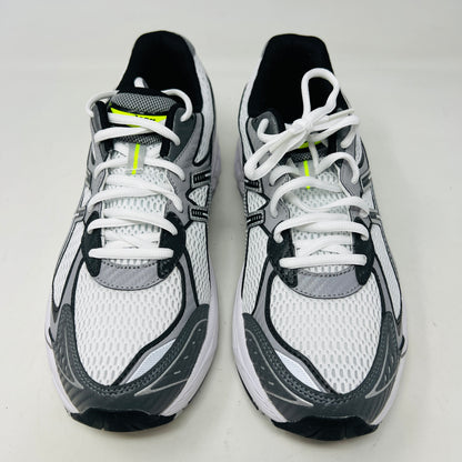 A brand new pair of ASICS GT-2160 JJJJound White sneakers, featuring mesh details and black stripes, is displayed on a black ASICS shoe box with extra laces in front for a complete authentic look.