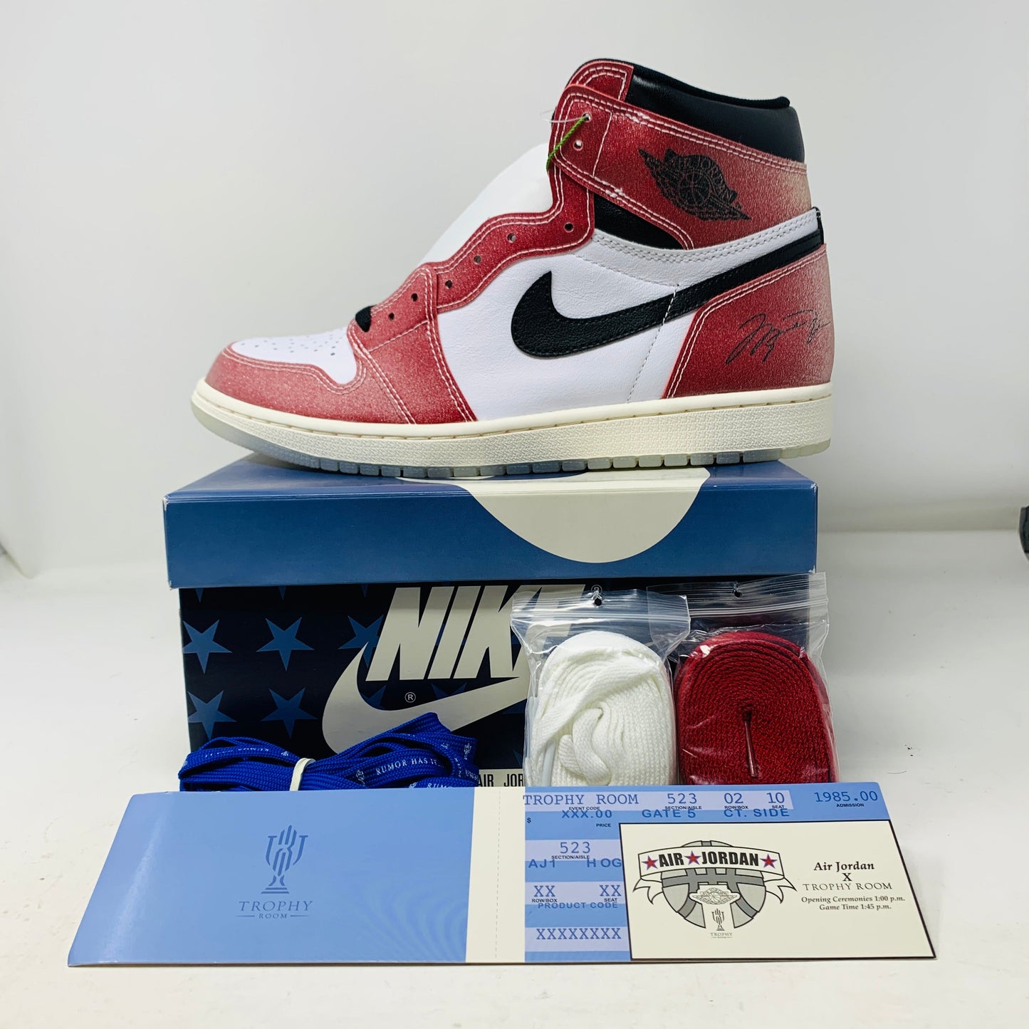 Jordan 1 Retro High Trophy Room Chicago sneakers with blue laces, brand new, 2021 edition.