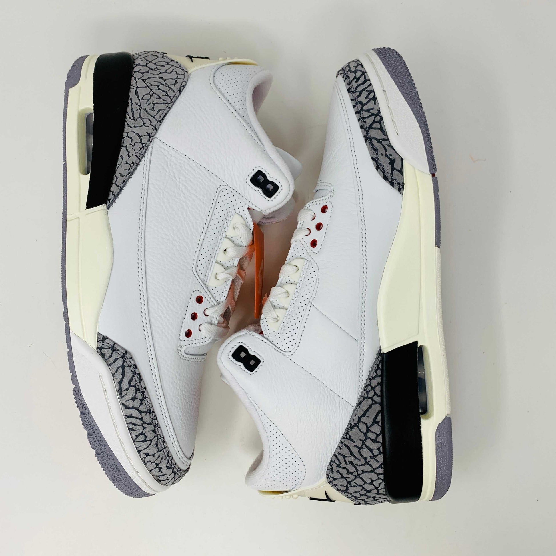 Jordan 3 Retro White Cement Reimagined sneakers with modern design.