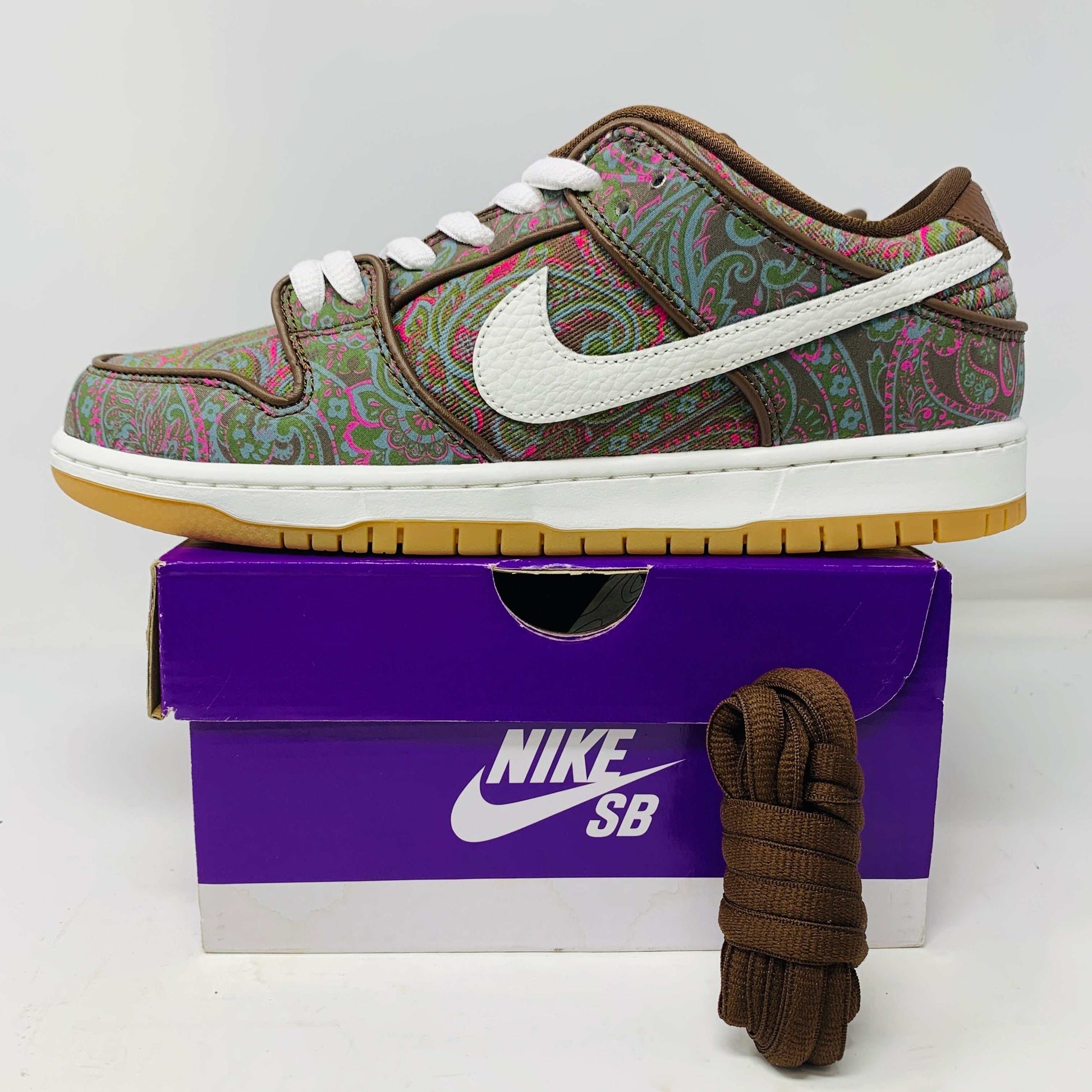 Nike SB Dunk Low Paisley Brown sneakers with box and brown laces.