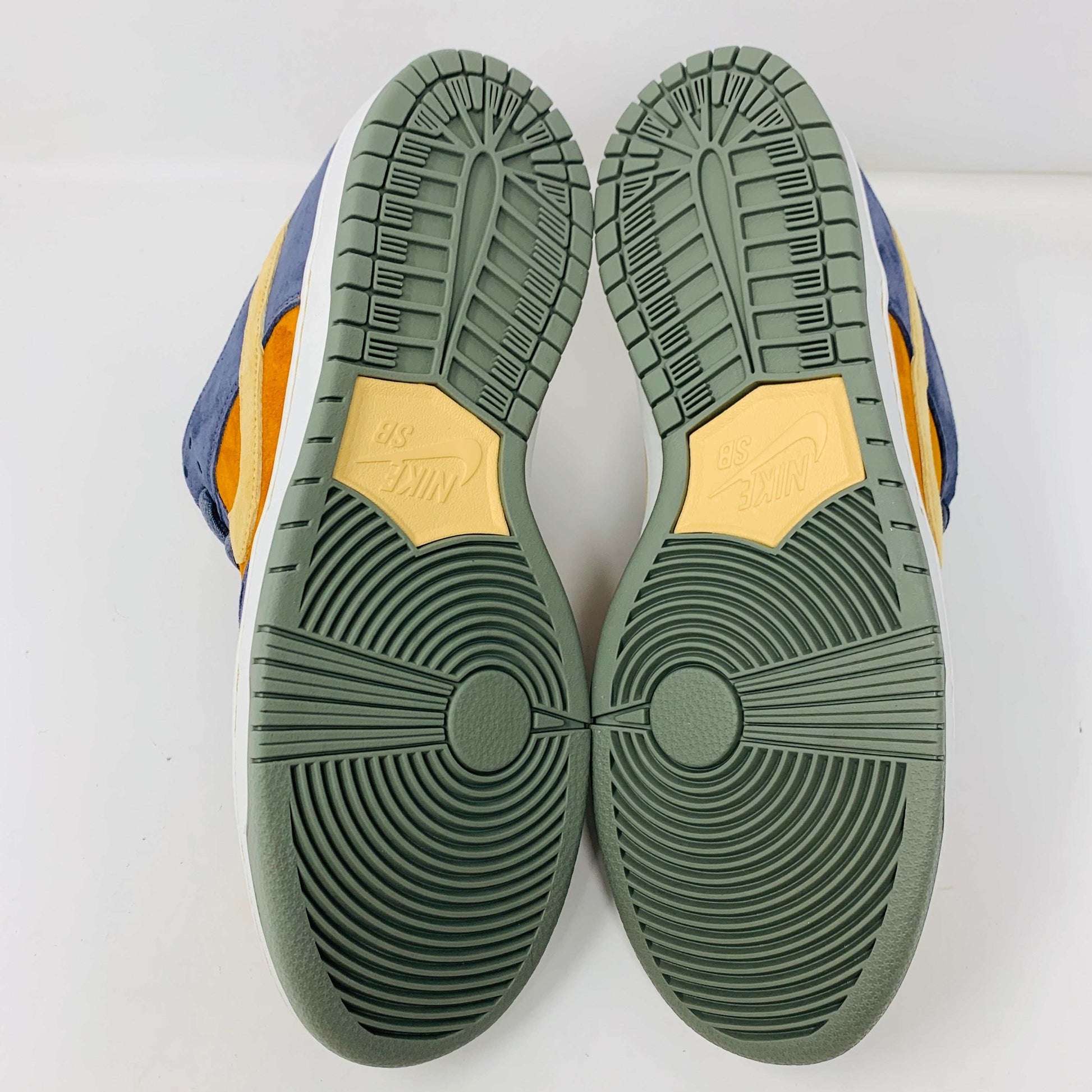 Nike SB Dunk Low Light Carbon Monarch sneakers, 2024, viewed from the sole.