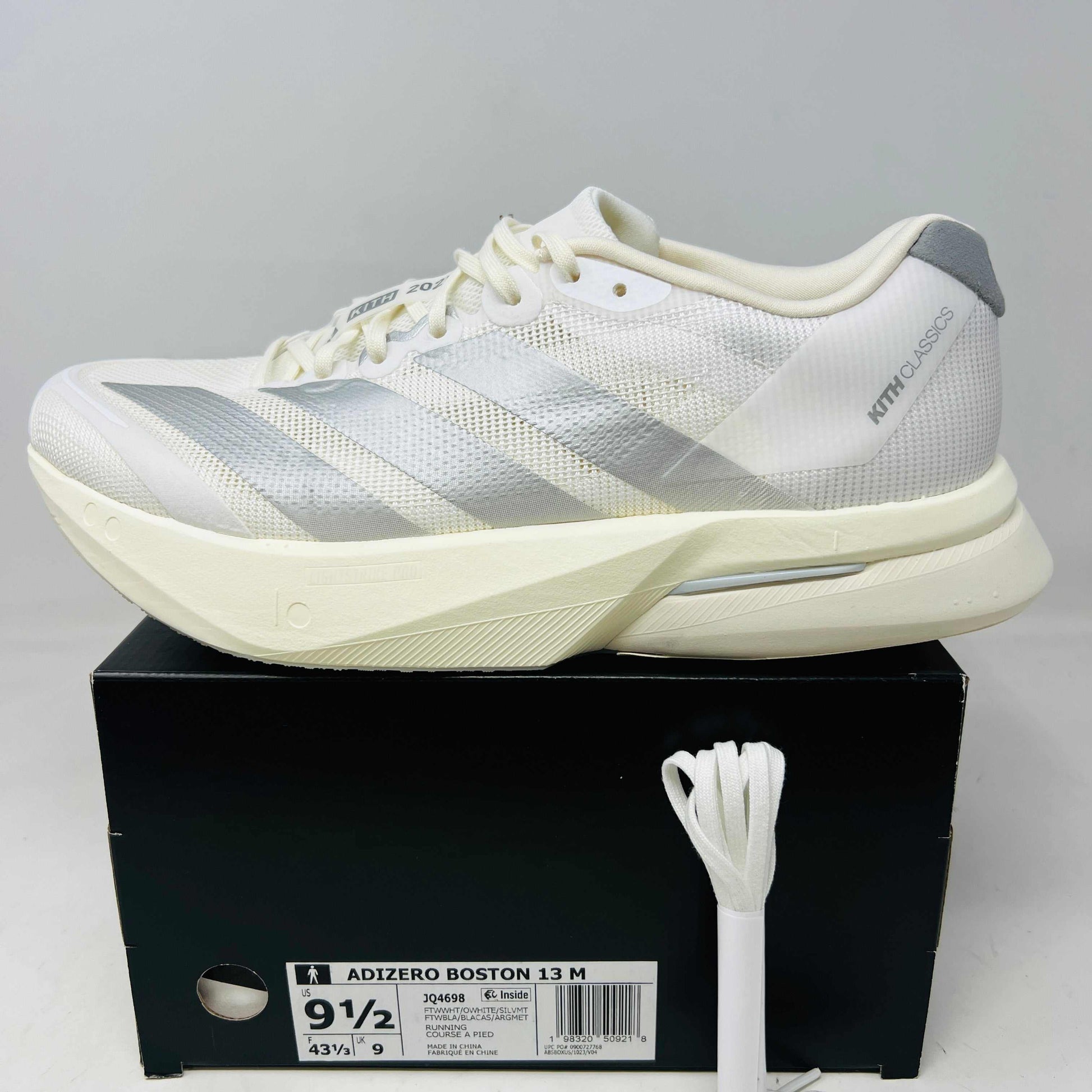 adidas Adizero Boston 13 Kith white silver metallic running shoe with white laces on box