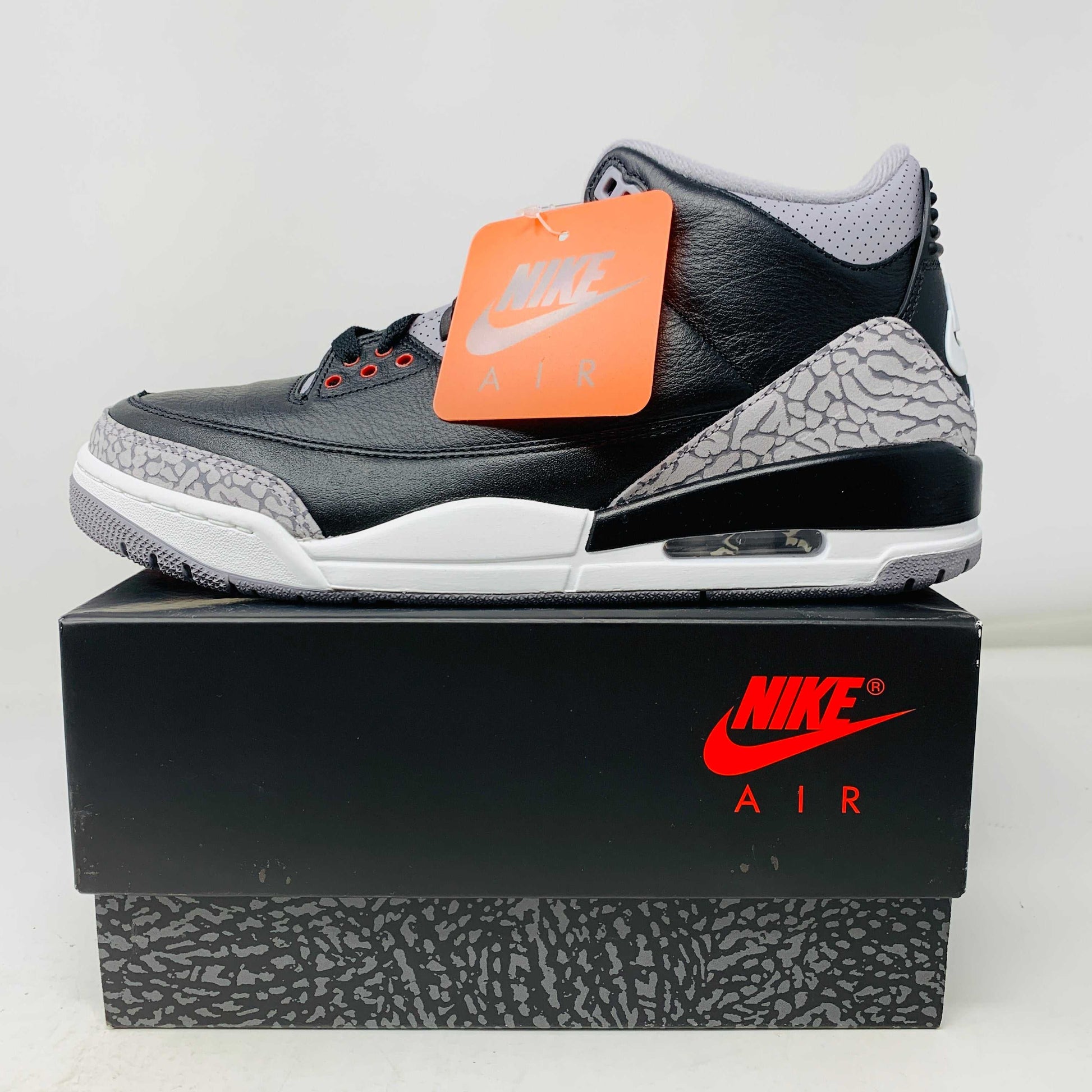Jordan 3 Retro OG Black Cement 2024 sneakers with hang tag on original box.