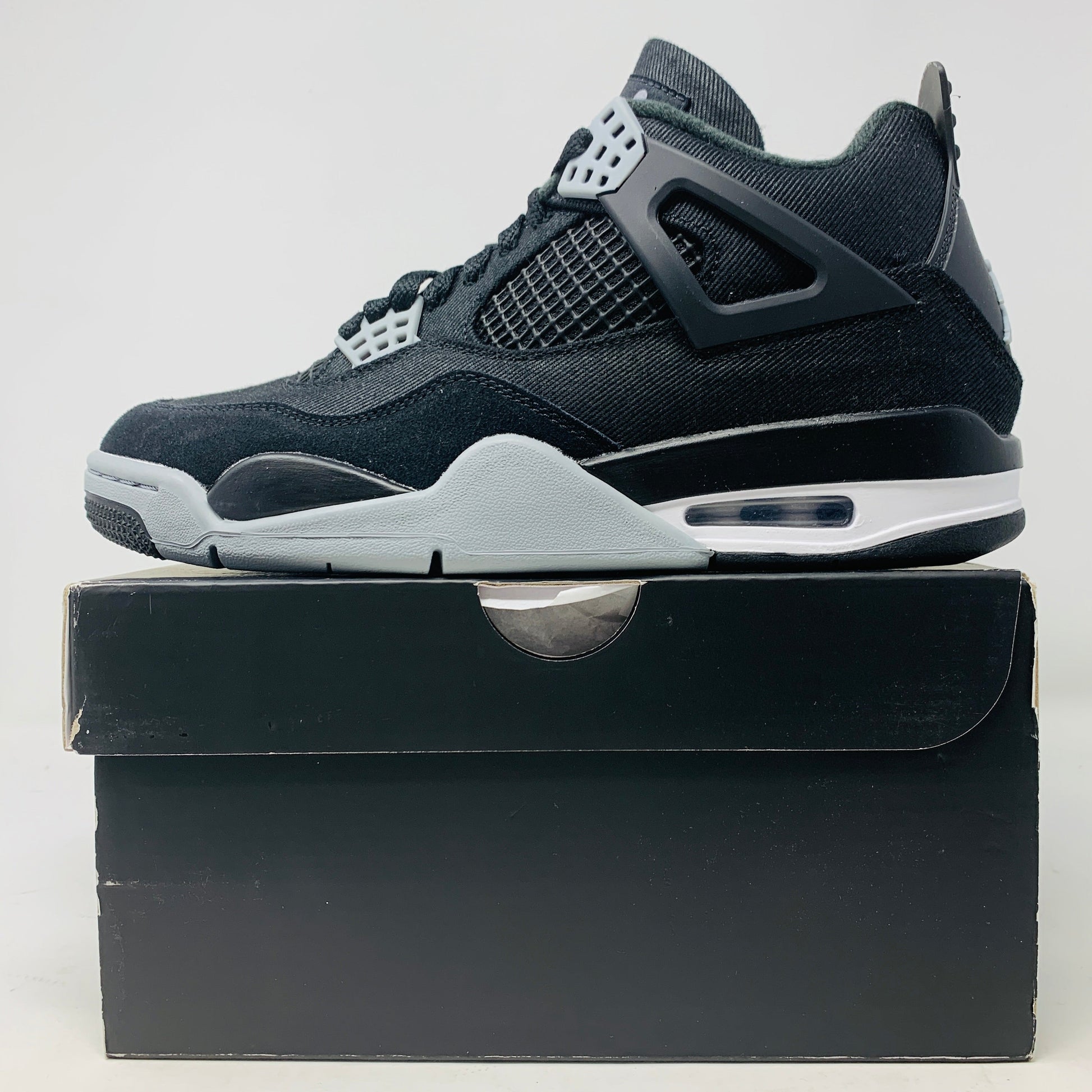 Jordan 4 Black Canvas sneaker, brand new, displayed on original box, 2022 release.