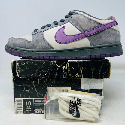 Nike SB Dunk Low Purple Pigeon sneaker on original box with extra white laces, lightly worn condition 2006 edition
