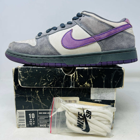 Nike SB Dunk Low Purple Pigeon sneaker on original box with extra white laces, lightly worn condition 2006 edition