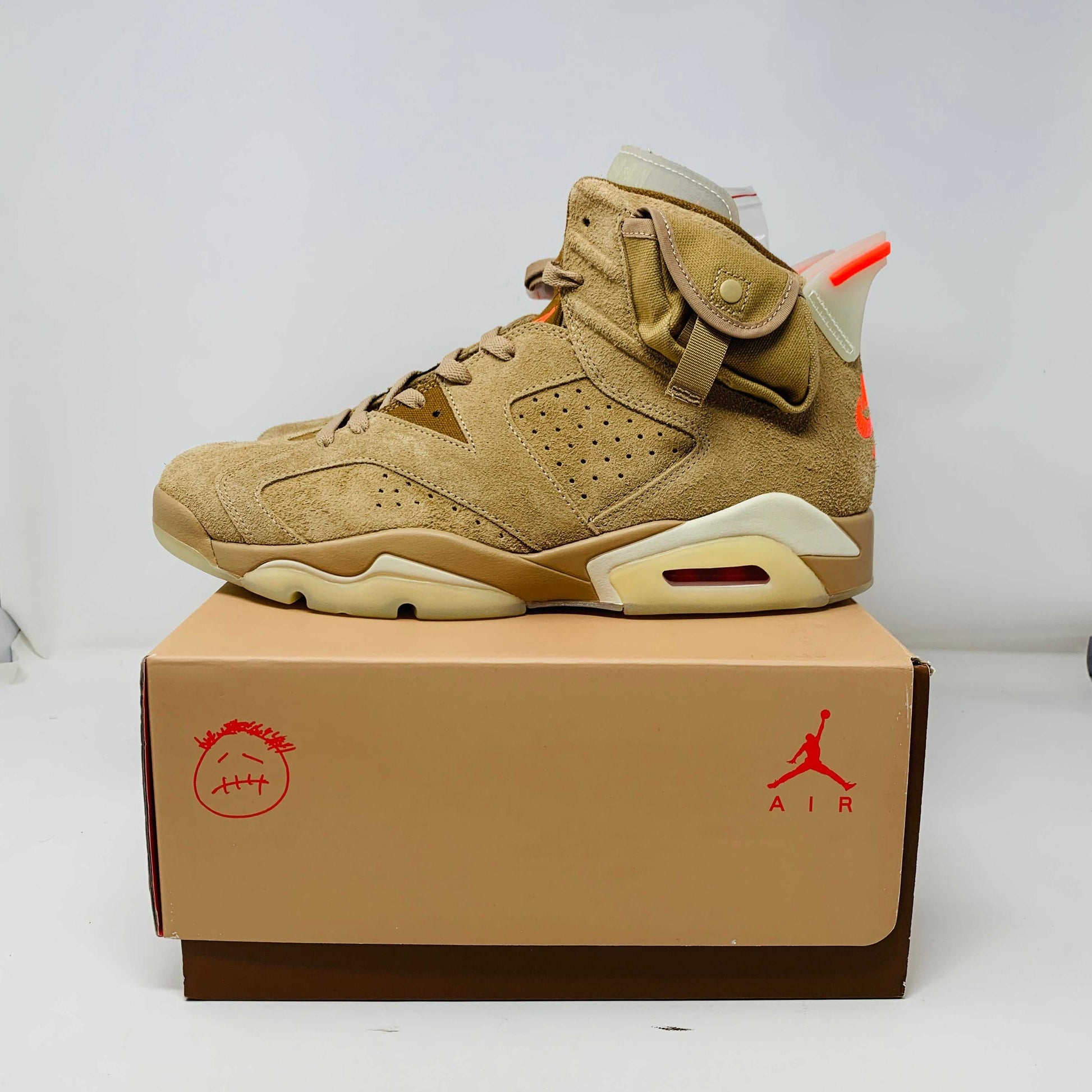 Jordan 6 Travis Scott Khaki sneakers with original box, extra red and brown laces, and lace locks, 2021 release.