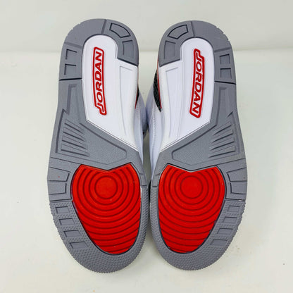 The Jordan 3 Retro Fire Red (2022) (GS) features white, red, and gray colors with elephant-print accents on a black-and-gray patterned box. The box has a red jumping silhouette and bold AIR lettering, making this BRAND NEW release ideal for collectors and enthusiasts.