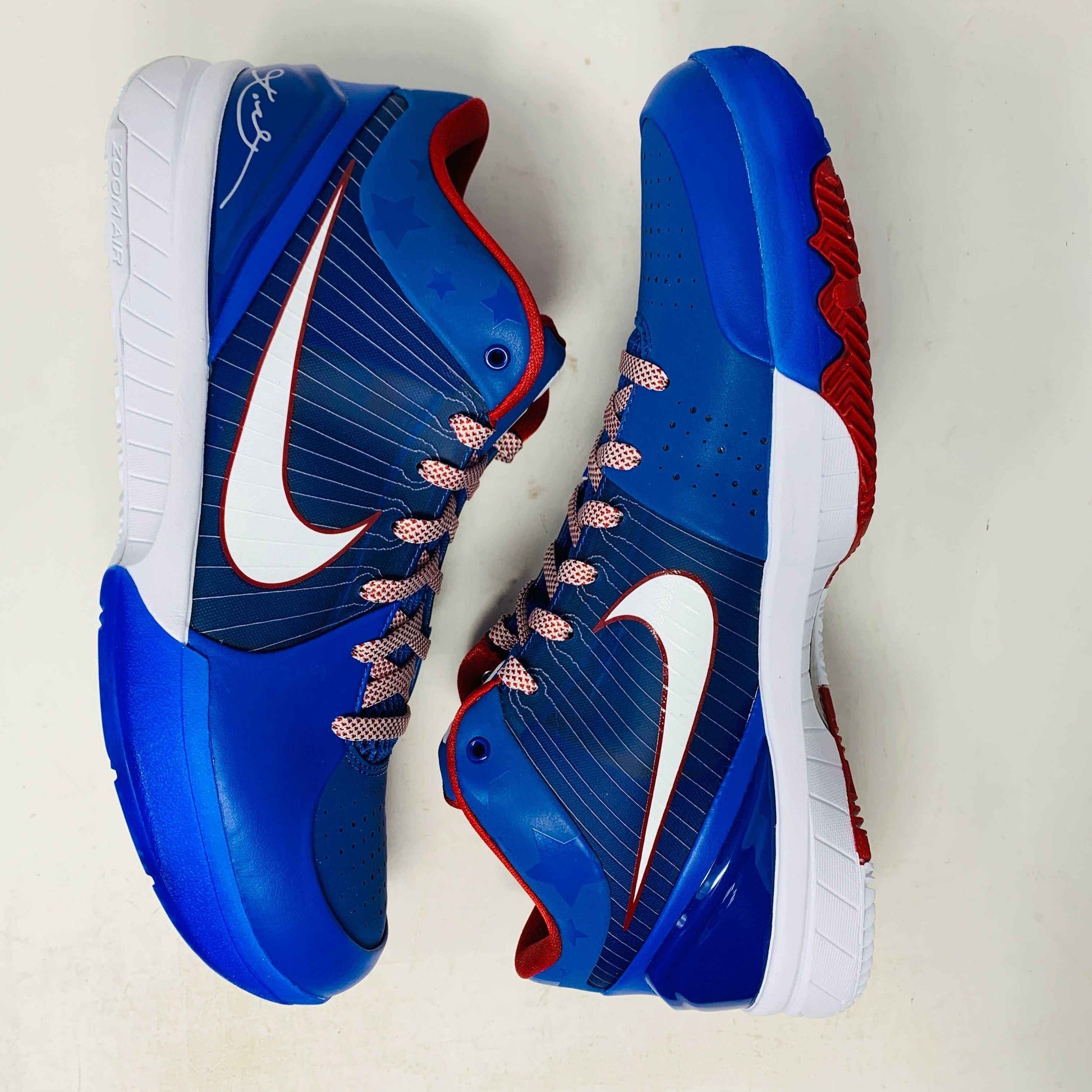 Nike Kobe 4 Protro Philly 2024 basketball shoe in black, white, red, and blue colorway.